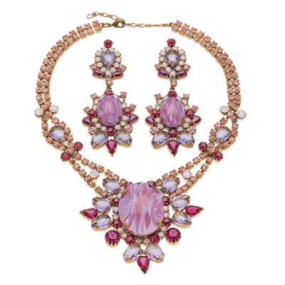 Pink rhinestone necklace and earrings in floral motif